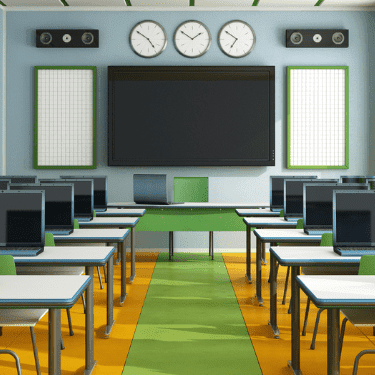 classroom with computers on each desk
