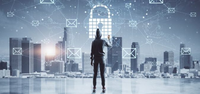 cyber criminal looking out over a city