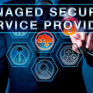 man touching icons on a computer screen