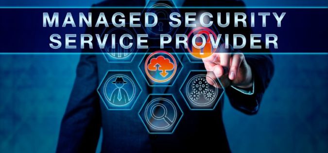 man touching icons on a computer screen