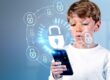 boy on cell phone with padlocks floating around it