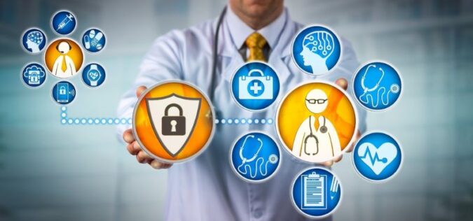 doctor in lab coat holding various cyber medical icons