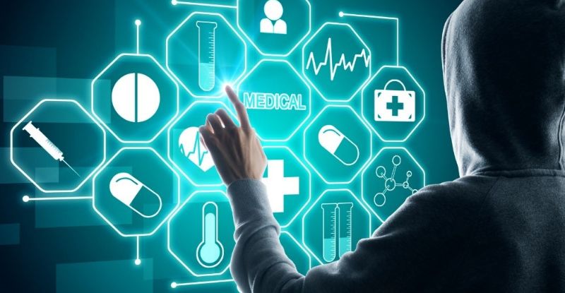 cybercriminal touching medical icons