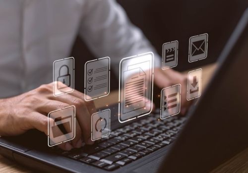 man typing with cybersecurity images