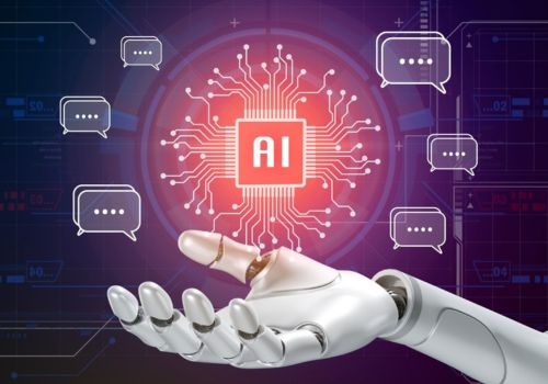 graphic of a robotic hand holding "AI" in it