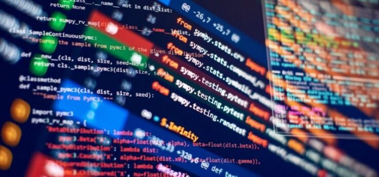color and black and white images on a monitor of computer code
