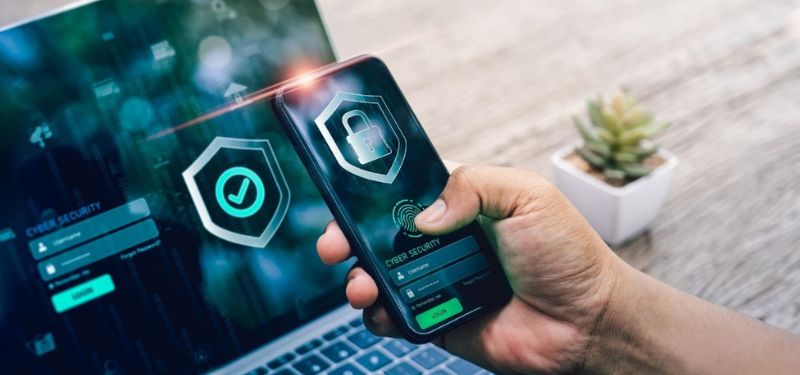 cell pohone being held with data encryption software on it