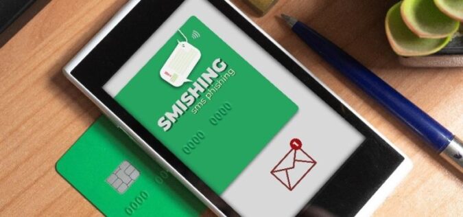 cell phone with a smishing scam image on the screen