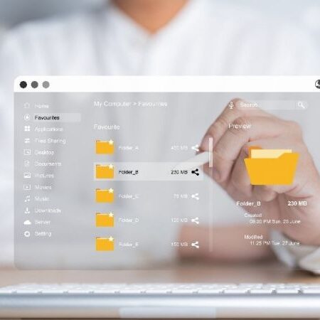 person sitting behind a transparent screen, image of file sharing taking place