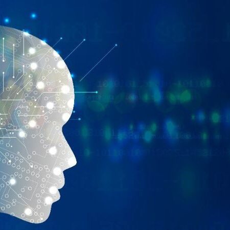 a digital silhouette of a human head with "AI" on the side of it looking to the right